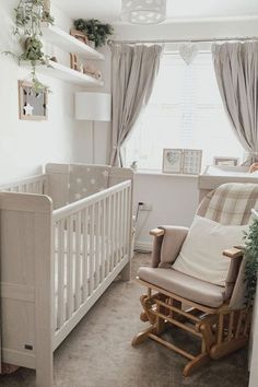 a baby's room with a rocking chair and crib