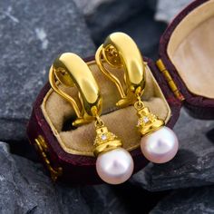 These beautiful Akoya pearl drop earrings are crafted of rich 18k yellow gold. The pearls are 7.8mm and the cap on each pearl holds 6 genuine diamonds. The earrings have a total drop length of 30mm, just over 1 1/4 inches. Akoya Pearls, Diamond Drops, Pearl Diamond, Diamond Drop Earrings, Pearl Drop Earrings, Pearl Drop, 18k Gold, Diamonds, Yellow Gold