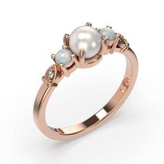 Pearl Engagement Ring Rose Gold, Elegant Three Stone Opal Ring, Elegant Three-stone Opal Ring, Elegant Three Stone Round Opal Ring, Elegant Three Stone Opal Promise Ring, Elegant Three-stone Moonstone Ring For Gift, Classic Three-stone Opal Ring For Wedding, Elegant Gold Opal Ring With Three Stones, Elegant Opal Birthstone Ring