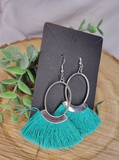 Handcrafted exclusively for your person favorite person in mind. These earrings are made with a silver metal oval with Turquoise fringe. All of earring hooks and jump rings are made of metal alloy, high quality nickel free & lead free, earring backs are made of clear silicone. They are safe and no reactions to very sensitive skin Metal Tassel Dangle Earrings With Fringe, Metal Tassel Fringe Drop Earrings, Silver Fringe Metal Earrings, Silver Dangle Tassel Earrings With Fringe, Trendy Silver Fringe Jewelry, Silver Nickel-free Dangle Tassel Earrings, Silver Dangle Tassel Earrings, Silver Nickel-free Drop Tassel Earrings, Silver Bohemian Tassel Earrings With Fringe