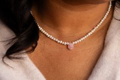 This dainty necklace, featuring freshwater pearls surrounding a rose quartz gemstone, is both unexpected and stylish. It gives off boho vibes with a splash of timelessness. Materials: freshwater pearls, rose quartz teardrop gemstone, 14k gold-filled extender and hardware Dimensions: 14 inches with 3-inch extender This piece is waterproof; if it gets wet, it will not tarnish. What is 14k gold-filled? Waterproof (won’t tarnish) Hypoallergenic (ideal for sensitive skin) Most affordable gold option Small Pearl Necklace, Gold Alloys, Rose Quartz Gemstone, Boho Vibe, Gold Filled Jewelry, Dainty Necklace, A Rose, Pearl Jewelry, Rose Quartz