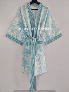 These cotton floral Print Robes are luxurious and sweet robes , and will make you and your bridesmaids feel like you're blossoming flowers and unique print ! This Robe we makes from 100% Cotton printed fabric . The fabric print is Floral Print which is very popular in all over the world . These robes are perfect for bridesmaids gifts, birthday gifts, and perfect gifts for girls who are in college. A beautiful lightweight cotton kimono-style hand-printed dressing gown. The gown is 100 cms / 39 " Blue Bohemian Floral Print Sleepwear, Summer Sleepwear Kimono With Prints, Blue Floral Print Robe For Home, Summer Floral Print Kimono For Sleep, Floral Print V-neck Robe For Summer, Printed Robe, Cotton Kimono, Womens Kimono, Women Nightwear