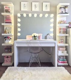 a white desk sitting in front of a mirror