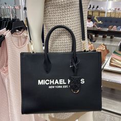 Michael Kors Medium Mirella 35s2g7zt7l Tote Bag In Black Description Pebbled Leather 100% Leather Trim 1: 60% Polyurethane/20% Cotton/20% Polyester Gold-Tone Hardware Interior Details: Back Zip Pocket, Front Slip Pocket Lining: 100% Polyes Handle Drop: 4.5” Adjustable Strap: 15”-25” 13.75”W X 10.75”H X 4.75”D Excluded Official Brand's Dust Bag, Box And Paper Bag High End Handbags, Leopard Purse, Reversible Tote Bag, Ostrich Leather, Nylon Tote, Tote Bag Purse, Tote Bag Leather, Shoulder Tote Bag, Black Patent Leather