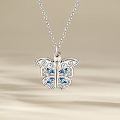 This photo necklace is the best choice to make the memory eternal. It features butterfly designed to open and close. The necklace is created in sterling silver with stunning details, with your own photo included, this beautiful piece will be more memorable. Never miss this romantic and exquisite piece!Carat Weight: 1 ctStone Size: 2*4 mmStone Type: Jeulia® StoneNumber of Stones: 8 Stone Color: Aquamarine BlueStone Shape: MarquiseWeight: 6.1 gWidth: 21.3 mmHeight: 21.4 mmThickness: 5.2 mmMaterial Sterling Silver Necklace With Butterfly Charm, Sterling Silver Butterfly Pendant Necklace, Sterling Silver Butterfly Necklace For Wedding, Sterling Silver Jewelry With Butterfly Clasp, Silver Sterling Silver Jewelry With Butterfly Clasp, Elegant Butterfly Birthstone Necklaces, White Gold Necklace With Butterfly Charm In Sterling Silver, White Gold Necklace With Butterfly Charm, White Gold Sterling Silver Necklace With Butterfly Charm