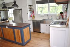 the kitchen is clean and ready for us to use in its new owner's home