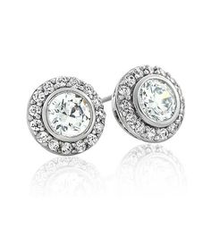 The Classic Bezel Studs is a staple for your earring collection. These earrings are classy and beautiful and can be worn from AM to PM. Every woman needs one in their collection! 5A Grade Cubic Zirconia Chandi Diamonds Prong Set Rhodium Plated Hypo Allergic Post Chandi Diamonds Brilliant Cubic Zirconia Stones (CZ's) sourced by Bobby Schandra and featuring the highest grade CZ’s in the world. Chandi Diamonds are known for their brilliance and represent the top 5% of CZ’s available on the market t Simple Cocktail Dress, Am To Pm, Earring Collection, Gowns Of Elegance, Wedding Jewellery Necklace, Earrings Collection, Real Diamonds, Necklace Designs, Rhodium Plated