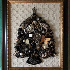 This Vintage Jewelry Mosaic Is Made Of 45+ Recycled Earrings, Brooches, Pendants And More In All Pieces Black & White. 1/2 Of The Pieces Are Amazing 4” Earrings From The 80s Made Of Plastic With Large Baubles & Dangles. The Rest Are Vintage Cluster Earrings, Pearl Drops, Cameos, Shoe Clips And Dress Clips. Each Piece Was Thoughtfully Arranged On Top A Textured Geometric Patterned Fabric And Then Framed With A Recycled Frame! Saving The Planet One Brooch At A Time. Jewelry Mosaic, Jewelry Trees, 4 Earrings, Recycled Earrings, Saving The Planet, Dress Clips, Dress Clip, Jewelry Tree, Earrings Pearl