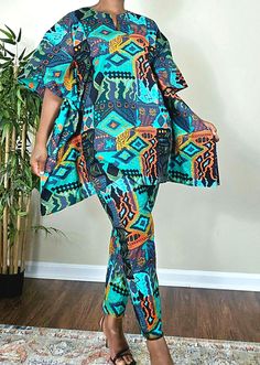 This stunning two-piece tie dye set is perfect for any occasion, from weddings to casual outings. Made with %100 cotton and featuring a vibrant tie-dye pattern, this outfit is both comfortable and stylish. The oversized kaftan top has a flattering V-neckline and 3/4 sleeves, while the pants have a straight leg style with an elastic waist and pockets.  The set includes an embroidered accent and is available in size M, L, and XL. This African-inspired outfit is perfect for those who love bold, colorful fashion and are handmade with care. Whether you're celebrating Easter or channeling the 80s, this outfit is sure to make a statement. Multicolor Cotton Pant Set For Summer, Cotton Sets With Kimono Sleeves For Summer, Summer Cotton Sets With Kimono Sleeves, Multicolor Printed Cotton Pant Set, Multicolor Cotton Ikat Print Sets, Multicolor Ikat Print Cotton Set, Multicolor Cotton Matching Pant Set, Multicolor Ikat Print Summer Sets, Multicolor Bohemian Pant Set For Summer