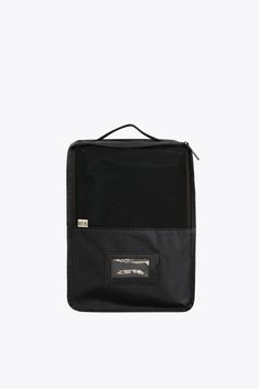 a black and grey bag with two zippers