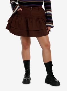 Add some ruffles to your look with this adorable skirt! It comes in a chocolate brown and features double ruffle layers  plus pockets at the hips.Please note: Style is fitted with no stretch; size up for a looser fit.100% cottonWash cold; dry lowLength: 19"ImportedModel is 5'10"Model wears size 1 Fall Tiered Ruffled Skirt, Fall Tiered Skirt With Layered Hem, Brown Skirted Bottoms With Ruffled Skirt, Brown Ruffled Skirted Bottoms, Brown Skirted Bottoms With Ruffled Detail, Brown Ruffled Skirt Bottoms, Fitted Brown Bottoms With Ruffles, Fitted Brown Tiered Mini Skirt, Brown Skirted Bottoms For Fall