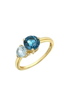 Two prong-set semiprecious stones bring vibrant sparkle to the center of this handcrafted 14-karat-gold ring and adds rich color to any stack. 1/2"W x 1/4"L setting Total stone weight: 1.43ct. 14k gold/blue topaz and peridot, blue topaz and citrine or blue topaz Imported Fine Jewelry Yellow Gold Round Cut Gemstones, Yellow Gold Blue Topaz Rings With Brilliant Cut, Yellow Gold Rings With Brilliant Cut Blue Topaz, Multi-stone Yellow Gold Birthstone Ring In 14k, Multi-stone 14k Yellow Gold Birthstone Ring, Yellow Gold Multi-stone Birthstone Ring In 14k Gold, 14k Yellow Gold Multi-stone Birthstone Ring, 14k Gold Yellow Gemstones With Brilliant Cut, Yellow Gold Blue Topaz Diamond Ring