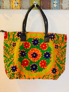 "Handmade item Material: Cotton/ Faux leather Color: Various H: 14\" W: 22\" Depth: 6.5\" Strap drop: 7.5\" Closure: Zipper Fully lined, 3 inside pockets Spot clean Made in India" Spring Festival Embroidered Bags, Guatemalan Textiles, North Las Vegas, Cotton Textile, Large Tote, Inside Pocket, Primary Colors, Bags Handbags, Las Vegas