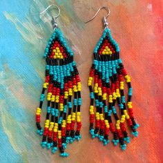 Boho Beaded Tribal Earrings With Turquoise, Yellow, Red, & Black Beads One Size About 4” Long New With Tag Southwestern Blue Beaded Earrings With Round Beads, Southwestern Style Multicolor Jewelry With Black Beads, Southwestern Multicolor Dangling Beads, Multicolor Southwestern Style Dangling Beads, Southwestern Style Multicolor Dangling Beads, Summer Multicolor Jewelry With Black Beads, Multicolor Jewelry With Black Beads For Summer, Blue Southwestern Beaded Fringe Earrings, Southwestern Blue Beaded Fringe Earrings