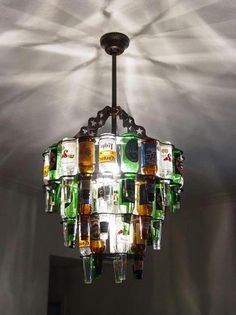 a chandelier made out of beer bottles