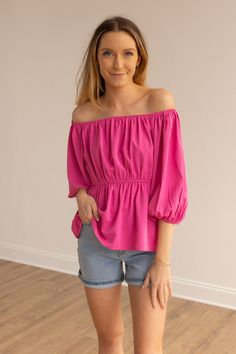 The Bold Blossom Pink Peasant Blouse is a charming and versatile off-the-shoulder top that brings a touch of bohemian flair to your wardrobe. With its relaxed and flowy silhouette, this blouse offers a casual yet stylish look. Fit: Relaxed Material: 100%PolyesterOur model is wearing: Size Small Chic Flowy Peasant Top With Puff Sleeves, Flowy Smocked Bodice Peasant Top For Spring, Chic Off-shoulder Peasant Top For Spring, Chic Peasant Top With Flowy Fit And Puff Sleeves, Off-shoulder Tops With Smocked Bodice For Vacation, Pink Off-shoulder Top For Brunch, Spring Off-shoulder Blouse For Day Out, Summer Off-shoulder Top With Blouson Sleeves, Spring Off-shoulder Top With Blouson Sleeves