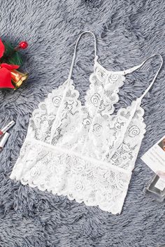 Tag: NoneCategory: Lingerie>BralettesSpecial Use: exotic apparelPackage Contents: 1 x topSize Type: regularPattern: patchworkStyle: sexyColor: whiteBrand: NonePackage: each piece in one pp bagDecoration: laceNeckline: hammockOccasion: bedtimeMaterial: 95%Polyester+5%SpandexDetail¢Floral pattern all over¢Transparent bodice which is very sexy¢Adjustable spaghetti straps¢Seductive deep v neckline¢Perfect to pair with pants¢Sexy bralettes. gorgeous lace styles wholesaleSize Chart (INCH) Sizes Waist White Camisole With Lace Patchwork, White Lace Crop Top With Lace Trim, White Lace Patchwork Stretch Tops, White Stretch Lace Patchwork Tops, White Stretch Tops With Lace Patchwork, White Lace Patchwork Crop Top For Spring, White Lace Trim Camisole Crop Top, White Lace Camisole Crop Top, White Lace Trim Crop Top For Party