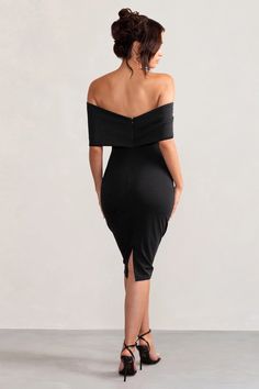 Meet Alyssa, our must-have midi dress made from a black scuba crepe that's both supportive and sculpting. Sure to turn heads at any formal event from birthdays to baby showers, this black bodycon dress features a Bardot neckline wrapped by a large bow and a split fitted skirt. Features - Premium scuba crepe - Bardot neckline - Large bow detail - Darted bodice - Bodycon fit - Invisible zip closure - Split hemline - Midi length Sizing & Fit Rona is 5’8' and wears UK size 8 / US size 4 Courtney is 5'10” and wears UK 16/ US 12 Product Information Designed exclusively at Club L London Good stretch Premium scuba crepe in Black (95% Polyester, 5% Elastane) 110cm total length SKU: CL127772002 We recommend buying a size down. Off-shoulder Fitted Midi Dress For Formal Occasions, Dressy Off-shoulder Midi Dress For Date Night, Off-shoulder Midi Dress For Formal Parties, Bodycon Knee-length Dress For Gala, Elegant Off-shoulder Midi Dress For Party Season, Spring Midi Length Bodycon Dress For Gala, Fitted Knee-length Midi Dress For Gala, Fitted Midi Bodycon Dress For Gala, Fitted Midi Dress For Dinner