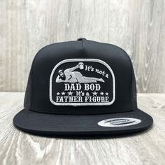 This Dad Bod "It's a Father Figure" funny embroidered patch on an all black Yupoong 6006 Classic high-crown mesh snapback baseball cap. Our patches are super high-quality and embroidered here in the USA. Each hat is made to order. We know you will love it! Fitted Black Trucker Hat, Black Fitted Trucker Hat, Adjustable Black Trucker Hat For Father's Day, Black Trucker Hat For Father's Day, Black Embroidered Trucker Hat, Black Flat Bill Hats For Father's Day, Embroidered Black Trucker Hat, Black Embroidered Trucker Cap, Adjustable Embroidered Black Trucker Hat