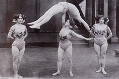 three women in leotards are balancing on one leg