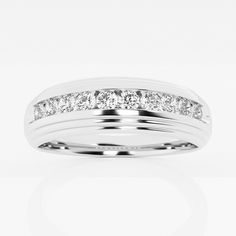 a white gold wedding ring with channeled diamonds