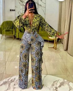 Introducing this beautiful, classic and unique suit, made with 💯  African cotton. Perfect outfit for any occasion. This style can be uttered to your preferences, you are free to remove and add more washing guide: wash with mild soap, do not bleach. Thank you for visiting our store. Please an easy conversation for more enquiry . African Pants Suit, Jumpsuit Ankara, African Jumpsuit, African Pants, African Shop, Styles Ankara, African Print Pants, Ankara Jumpsuit, African Print Jumpsuit