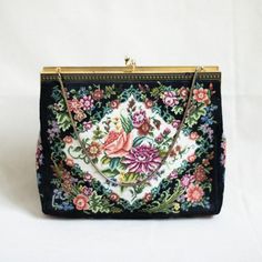 Selling this stunning needlepoint purse.  I purchased this purse at an estate sale.  The woman who owned this purse was a world traveler.  Many of her items were French and Italian.  I assume this was either made in France or Italy.  Lovely work.  Floral detail from top to bottom.  Gorgeous use of color.  No fading or flaws on fabric.  The only issues is the clasp has something black on one side of it as can be seen in pictures.  I actually was able to scrape most of it off so it is much less now than in pictures. Gorgeous vintage piece.  One storage pocket inside.  Chain shoulder strap.  This would make such a fun Christmas gift!   Measures 8x9.5" All the items I sell are vintage. I do my best to disclose flaws. Please contact me with any questions.  I am happy to answer. Ship time is 1-3 Vintage Shoulder Bag, Party Purse, Formal Wedding, Best Christmas Gifts, Floral Embroidery, Clutch Handbag, Formal Event, Evening Bags, Needlepoint