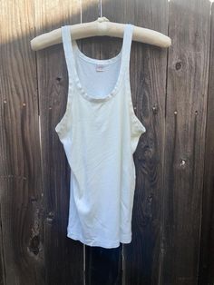 Vintage t Shirt tank top Measurements Chest/bust Length condition: has stains Spring Workout Cotton Vest, White Cotton Racerback Muscle Tee, Summer Cotton Vest With Scoop Neck, Cotton Tank Vest For Workout, White Workout Camisole Top, Basic Vest Top With Tank Straps, Basic Summer Vest With Tank Straps, White Tank T-shirt For Workout, White Cotton Workout Vest