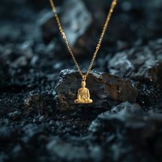 Find peace and enlightenment with our gold Buddha pendant, exquisitely crafted in the USA. Symbolizing serenity, wisdom, and spiritual awakening, each piece is a sanctuary of calm and reflection. PENDANT INFORMATIONThis pendant is made of real, solid gold.• Made in USA• Size: MINI• Height: 1" (25 mm) x Width: 0.72" (18 mm)• Pendant weight (approx.): 3 grams (14k)• Bail: fits up to 4 mm chains• Solid back, not hollow• A certificate of authenticity is included• Delivered in our elegant jewelry box Spiritual Recycled Gold Round Pendant Jewelry, Spiritual Recycled Gold Pendant Jewelry, Spiritual Recycled Gold Tarnish-resistant Jewelry, Spiritual Yellow Gold Jewelry In Recycled Gold, Spiritual Yellow Gold Recycled Jewelry, Spiritual Style Yellow Gold Recycled Jewelry, Amulet Style Pendant Jewelry For Meditation, Meditation Amulet Pendant Jewelry, Spiritual Yellow Gold Tarnish-resistant Necklace