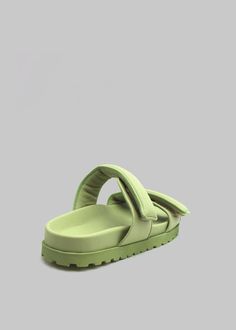 Color: Acid Green Padded genuine leather upper Slip-on style Velcro strap closure Molded footbed Rubber sole 100% Lamb leather Lining: 100% Leather kid By Gia Borghini. Made in Italy Green Leather Footbed Sandals With Cushioned Footbed, Green Leather Footbed Sandals, Green Leather Open Toe Footbed Sandals, Green Leather Footbed Sandals Casual Style, Green Leather Casual Footbed Sandals, Casual Green Leather Footbed Sandals, Summer Green Footbed Sandals With Leather Footbed, Green Closed Toe Mules With Cushioned Footbed, Green Open Heel Sandals With Rubber Sole