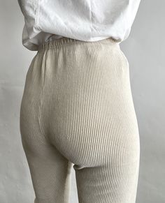 "Essential Ultra High Waist Ribbed Leggings in Cream Color. Size L. Fits S/M best. Please refer to measurements below. Made in Korea of 76% Cotton, 12% Polyester and 12% Spandex. Elastic waist. Condition is Beautiful. Shows normal signs of wear.  The colors of the photographs may differ slightly from the actual item colors. Measurements were taken with item laying flat, and are approximate. Waist: 12\"-14\" Rise: 12\" Hips: 18\" Inseam: 28 1/4\" Length: 38\" Please message questions prior to purchase- I'm happy to help. Once shipped, sales are final, no return/exchange. But please contact me if you have any problems with your order. Thanks! Shown on a 5'8\" 34B." Tight Ribbed Leggings For Loungewear, High Waist Solid Ribbed Bottoms, High Waist Ribbed Loungewear Bottoms, High Waist Ribbed Bottoms For Loungewear, Solid Ribbed Leggings For Loungewear, Ribbed High Waist Bottoms For Loungewear, Solid Color Ribbed Leggings For Loungewear, Tight Ribbed Pants For Loungewear, Tight Fit Bottoms With Ribbed Waistband For Loungewear