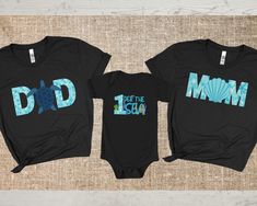 "Looking for matching family shirts for a mermaid themed first birthday party. These cute shirts are perfect for a beach birthday party for a little boy or girl turning 1. Oneder the sea Birthday Family Matching shirts, First birthday shirt, 1st Birthday Party, Mermaid Birthday t-shirt, Beach birthday shirt ⭐️HOW TO ORDER⭐️ Select your quantity of shirts in the specific colour/size and click \"ADD TO BASKET\"   Repeat as needed by returning to the listing button to add more shirts. Proceed to Checkout  Price is per shirt. Please add each shirt to your cart individually and then checkout. ⭐️Sizing⭐️ Our adult shirts come in unisex sizing, if you are after a more fitted look you may wish to size down, alternatively your usual size will have a looser fit that looks great tied or tucked in! Fo Personalized Family Matching T-shirt For Summer, Summer Family Matching Tops For Gender Reveal, Family Matching Tops For Gender Reveal In Summer, Family Matching Tops For Summer Gender Reveal, Playful Summer Family T-shirt, Blue Summer T-shirt For First Birthday, Fun T-shirt For Summer Gender Reveal, Custom Print Tops For Gender Reveal In Summer, Summer Tops For Gender Reveal With Custom Print