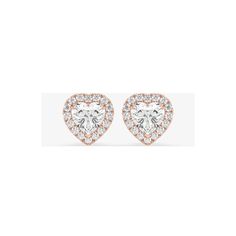 These stunning 14K gold halo heart stud earrings are the perfect gift for any occasion. The heart-shaped lab-grown diamond is surrounded by a halo of smaller diamonds, giving them a timeless and elegant look. The push-back closure ensures a secure fit on the earlobe, while the excellent cut grade and VS1 clarity grade ensure that the diamonds sparkle brilliantly in any light. These earrings are handmade with a total carat weight of 1.00 and come with a certification from Gemyor. Add a touch of love to your jewelry collection with these classic Gemyor Earrings. EARRING INFORMATION Item No.: ECC125LG Metal Type:14K Metal Color: Rose/White/Yellow Approximate Total Carat Weight: 1.00 LENGTH: 8.21 mm WIDTH: 8.21 mm Style: Halo Stud MAIN STONE INFORMATION Type: Lab Grown Diamond Shape: Heart App Heart App, Heart Halo, Halo Stud Earrings, Halo Earrings Studs, Gold Halo, Heart Studs, Heart Earrings Studs, Diamond Halo, Diamond Shape