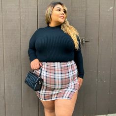 Pair Our Audrey Plaid Skirt With A Pair Of Booties And A Long Sleeve For A Perfect Fall Outfit. Model Is Wearing 2x. Materials: 95% Polyester, 5% Spandex. Sizing Chart: 1x (14/16), 2x (18/20), 3x (20/22). *Not Fashion Nova Brand Skirts Plaid, Silver Sequin Skirt, Coral Skirt, 70 Fashion, Silver Skirt, Perfect Fall Outfit, Satin Midi Skirt, 60 Fashion, Black Leather Skirts