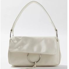 Product Sku: 79789962; Color Code: 001 Essential Shoulder Bag In A Y2k Baguette Silhouette. Front Flap Closure With A Metal Ring Accent Opens To A Lined Interior With Pockets For Your Essentials. Finished With A Structured Leather Shoulder Strap. Content + Care - 100% Pu - Spot Clean - Imported Size - Dimensions: 11"L X 3"W X 6.5"H; 8.5" Strap Drop Trendy Clutch Shoulder Bag With Handle Drop, Baguette Clutch Bag With Removable Pouch For Errands, Clutch Shoulder Bag With Top Carry Handle For Errands, Trendy Urban Outfitters Tote Bag, Rectangular Travel Bags By Urban Outfitters, Urban Outfitters Rectangular Bag With Adjustable Strap, Rectangular Travel Bag From Urban Outfitters, Chic Rectangular Bags From Urban Outfitters, Chic Rectangular Bags By Urban Outfitters