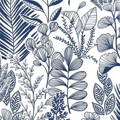 a blue and white floral wallpaper with lots of leaves on the bottom half of it