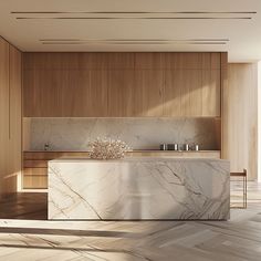 an elegant kitchen with marble counter tops and wooden cabinets, along with hardwood flooring