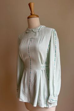 Vintage 1970s Cacharel Peasant Blouse https://www.etsy.com/roguegirlvintage/listing/1484649103 Fitted Blouse For Spring Gatherings, Green Vintage Print Blouse For Spring, Spring Green Blouse With Vintage Print, Vintage Summer Blouse For Gatherings, Vintage Style Summer Blouse For Gatherings, Vintage Blouse For Summer Gatherings, Vintage Blouse For Spring Garden Party, Vintage Long Sleeve Blouse For Gatherings, Fitted Blouse For Garden Party