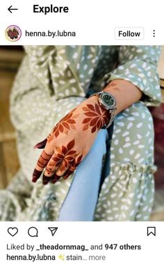 a woman's hand with henna painted on it and the words explore below