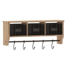 a coat rack with three hooks and two baskets