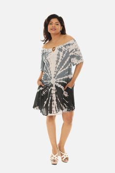 This gorgeous tie-dye dress is perfect for summertime fun! Crafted from light and airy material, you'll love the key-hole neckline that adds a hint of sultry style. Wear with flip-flops for an easy beachy vibe or add a pair of heels for a night on the town. You're sure to love this stylish and comfortable look! Casual Tie-dye Mini Dress, Casual Flowy Tie-dye Dress, Casual Tie Dye Festival Dress, Casual Tie-dye Festival Dress, Casual Tie Dye Dress For Festival, Casual Flowy Tie Dye Dress, Casual Tie-dye Dress For Beach Cover-up, Casual Tie Dye Dress For Beach Cover-up, Casual Tie Dye Mini Dress