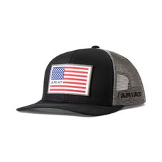 a black and gray hat with an american flag patch