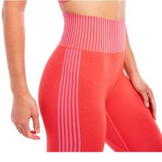 By Sage Collective. Made With Nylon, Polyester, And Spandex. This Features A Moisture-Wicking Function That Are Both Comfortable And Stylish, Striped High Waisted Leggings Feature A Sleek 7/8 Length Silhouette For Sporty-Chic Style. Seamless High-Rise Leggings With Contrasting Stripe Detail. Color Tiger 9.5" Rise, 23.5" Inseam (Size L) Ribbed Waistband Pull-On Style High Rise Fitted Leg Stripe Print Flatlock Inseams; No Outseams Stretch Knit Construction 7/8 Crop 57% Nylon, 38% Polyester, 5% Spa Pink Breathable Elastane Activewear, Pink Micro-elastic Sports Tights, Breathable Pink Sports Tights, Pink Elastane Yoga Pants For Training, Pink Sports Leggings With Stretch, Pink Breathable Activewear, Pink Sportswear Leggings, Pink Sports Tights, Pink Breathable Micro-elastic Leggings