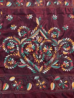 Gorgeous Deep Maroon saree with handwoven Kantha stitch work in Multi color. Item: SareeColor : Deep Maroon with Multi color Kantha Work Base Fabric: Bangalori Silk Blouse piece : YesBlouse material: Bangalori Silk Work: Handloom, Kantha Work Fall & Edging (Yes/No) : Yes Disclaimer -:- Color variation is possible due to various reasons like phone or desktop setting, resolution etc. Please don't hold us responsible. Our aim is to put the exact color of the Saree.- If the Saree is Pure Silk, we wi Bohemian Style Art Silk Kurta For Festivals, Bohemian Art Silk Salwar Kameez For Festivals, Bohemian Art Silk Salwar Kameez For Festive Occasions, Bohemian Blouse Piece With Pallu For Traditional Ceremonies, Bohemian Kurta With Cutdana For Puja, Resham Embroidered Dupatta For Transitional Festivals, Bohemian Art Silk Choli With Resham Embroidery, Navratri Bohemian Art Silk Blouse Piece, Bohemian Art Silk Blouse Piece For Navratri