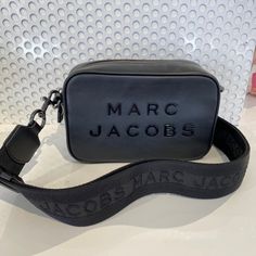 100% Authentic Guarantee Brand New With Tag No Dust Bag Included Please Message Me Before You Purchase To Confirm The Availability. Approx. Measurements: 8.5" L X 5.5" H X 3" W Interior: Inside Slip Pocket Closure: Zipper 1 Strap Marc Jacobs Hobo Bag, Marc Jacobs Crossbody Bag, Luxury Brand Names, Marc Jacobs Purse, Marc Jacobs Tote, Marc Jacobs Handbag, Hobo Crossbody Bag, Luxury Bags Collection, Oversized Tote Bag