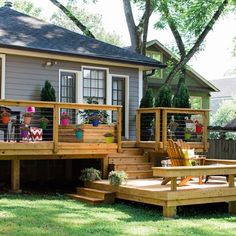 a wooden deck in front of a house