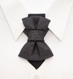 "Hopper tie is a new original product, presented by Ruty Design. This unisex accessory is a modern combination of elements found on traditional ties and bow ties. Why choose Hopper ties? If you value exclusivity and comfort, this is the accessory for you! The most important feature of the accessory for women - versatility! It, in addition to the usual way, can also be worn as a brooch and as a pendant (by inserting an existing chain, bow, etc. into its upper fold). The accessory can be additiona Cheap Elegant Business Ties, Luxury Professional Suit And Tie Accessories For Office, Luxury Elegant Evening Suit And Tie Accessories, Luxury Elegant Ties For Business Casual, Luxury Modern Suit And Tie Accessories For Work, Cheap Tie-side Bottoms For Parties, Luxury Solid Suit And Tie Accessories For Work, Luxury Elegant Suit And Tie Accessories For Workwear, Necktie For Women