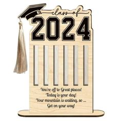 a graduation card with the words class of 202 on it and a tassell hanging from