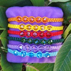 These are handmade crystal bead bracelet, with nylon thread. The colors are vibrant and they are made to be adjustable. The shine on the crystal beads are so eye catching. The colors you can choose from are purple, red, pink, blue, orange, green, yellow, black, brown and white. These are perfect as a gift or as a little treat to yourself. Handmade Multicolor Beaded Bracelets With Nylon Cord, Adjustable Rainbow Braided Beaded Bracelet, Adjustable Crystal Bracelet With Colorful Beads For Friendship, Adjustable Rainbow Beaded Crystal Bracelet, Adjustable Rainbow Crystal Bracelet, Crystal Bead Bracelet, Bracelets Beaded, Beads Bracelets, Crystal Beads Bracelet