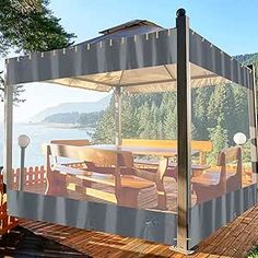 a covered deck with chairs and tables on it